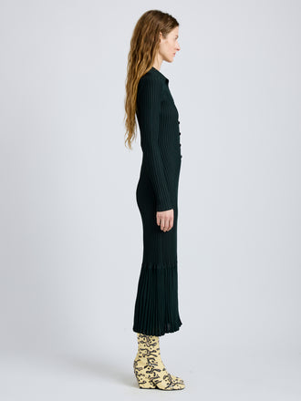 Proenza Schouler Side full length image of model wearing Luiza Dress in Sunburst Rib in Bottle Green