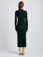 Proenza Schouler Back full length image of model wearing Luiza Dress in Sunburst Rib in Bottle Green