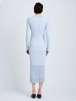 Proenza Schouler Back full length image of model wearing Luiza Dress in Sunburst Rib in Pale Blue