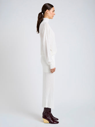 Proenza Schouler Side full length image of model wearing Luiza Skirt in Sunburst Rib in White