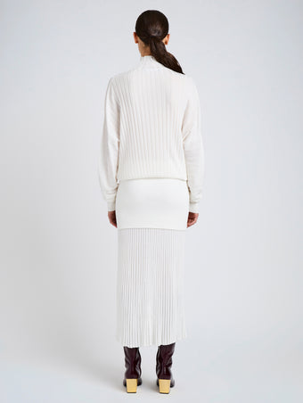 Proenza Schouler Back full length image of model wearing Luiza Skirt in Sunburst Rib in White