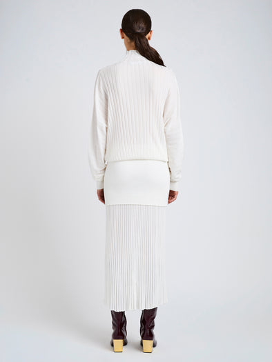 Proenza Schouler Back full length image of model wearing Luiza Skirt in Sunburst Rib in White
