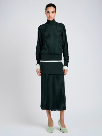 Proenza Schouler Front image of model wearing Luiza Sweater in Sunburst Rib in Bottle Green 