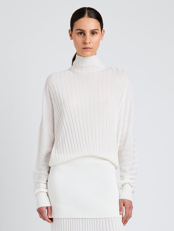 Proenza Schouler Front cropped image of model wearing Luiza Sweater in Sunburst Rib in White