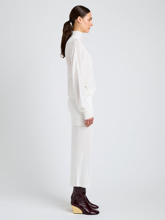 Proenza Schouler Side image of model wearing Luiza Sweater in Sunburst Rib in White