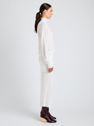 Proenza Schouler Side image of model wearing Luiza Sweater in Sunburst Rib in White