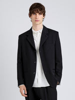 Proenza Schouler Front cropped image of model wearing James Jacket in Wool Suiting in Black