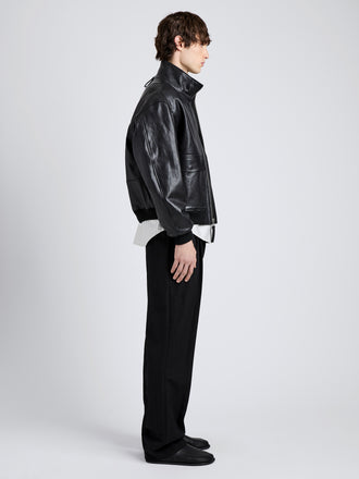 Proenza Schouler Side full length image of model wearing Sterling Bomber in Leather in Black
