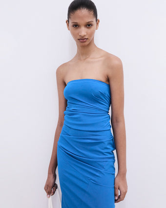 Cropped image of model wearing Odette Strapless Dress in Silk Viscose in cerulean