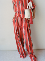 Proenza Schouler Front crop image of model wearing Amira Pant in Printed Silk Habotai in Vermillion Multi