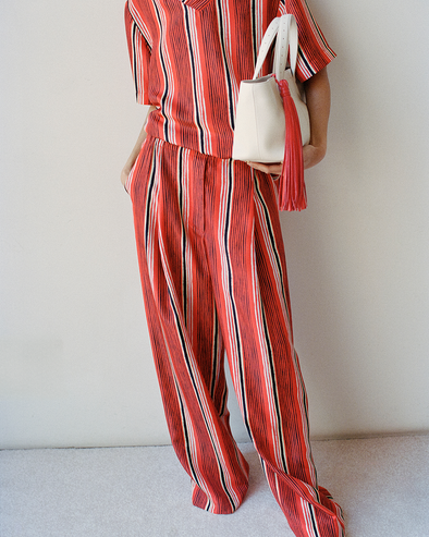 Proenza Schouler Front crop image of model wearing Amira Pant in Printed Silk Habotai in Vermillion Multi