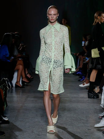 model wearing yellow lace dress