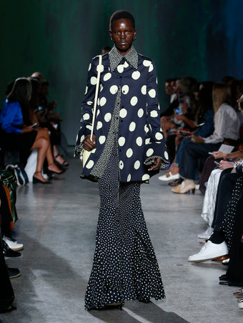 model wearing dot print top and pant