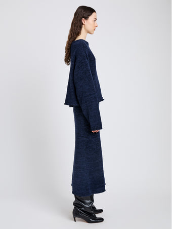 Proenza Schouler Side full length image of model wearing Maddox Sweater in Marled Cotton in Navy Black Ombre