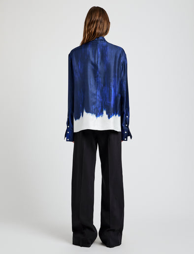 Proenza Schouler Back full length image of model wearing the Mara Top in Double Printed Silk Twill in Cobalt Multi 