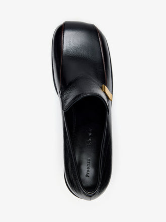 Proenza Schouler Aerial Still Life Image of Esme Loafer in Nappa Latex in Black