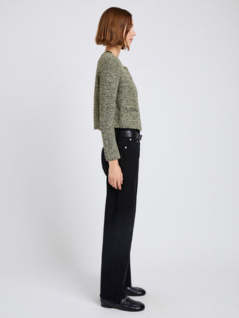 Proenza Schouler Side full length image of model wearing Nidia Macrame Jacket in Cotton in Light Butter/Black
