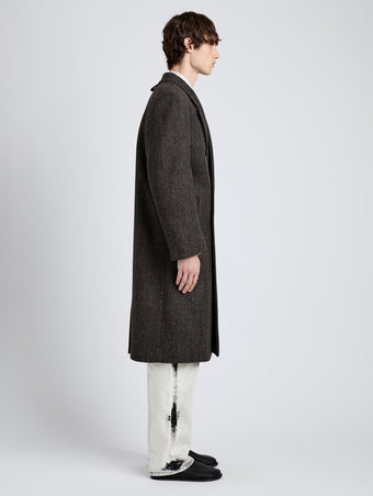 Proenza Schouler Side full length image of model wearing Orlando Coat in Wool in Charcoal Herringbone