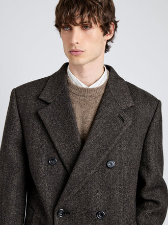 Proenza Schouler Detail image of model wearing Orlando Coat in Wool in Charcoal Herringbone