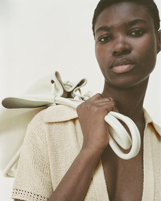 Cropped image of model wearing Auden Dress in Textured Knit in YELLOW