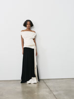 Proenza Schouler image of model standing wearing the Daliah Dress in Satin Back Crepe in Black/Ecru