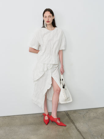 Proenza Schouler Front full length image of model wearing Hansly Skirt in Memory Cotton in Off White