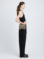 Proenza Schouler image of model wearing PS1 Mini Crossbody Bag in Nubuck Calf in slate