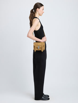 Proenza Schouler image of model wearing PS1 Mini Crossbody Bag in Nubuck Calf in tobacco