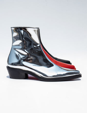 Stack of Bronco Boots in silver metallic, red, and black