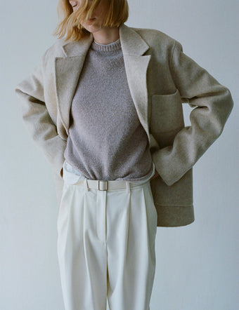 Cropped image of model's in Amalia Jacket in Double Face Wool in oat, Eleanor Pant in Stretch Suiting in bone, and Tara Knit Sweater in Wool Blend in fig