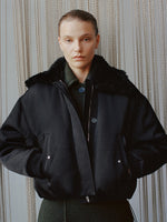 Proenza Schouler Front cropped image of model wearing Vadra Jacket in Recycled Nylon Twill in Black