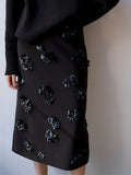 Proenza Schouler Detail image of model wearing Moira Skirt in Embroidered Compact Crepe in Black