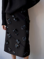 Proenza Schouler Detail image of model wearing Moira Skirt in Embroidered Compact Crepe in Black