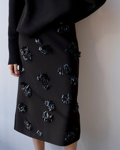 Proenza Schouler Detail image of model wearing Moira Skirt in Embroidered Compact Crepe in Black