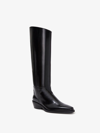 Proenza Schouler front 3/4 image of Bronco Knee High Boots in Spazzolato Leather in black