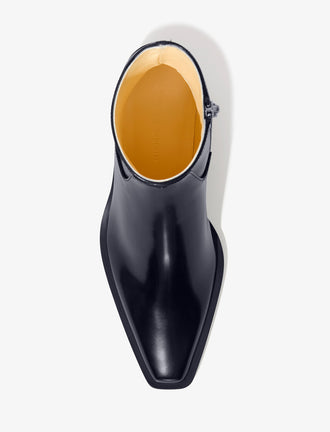 Proenza Schouler aerial image of Bronco Ankle Boots in black