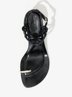 Aerial image of the Tee Toe Ring Sandals in black/cream