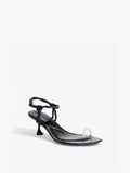 Front 3/4 image of the Tee Toe Ring Sandals in black/cream  Edit alt text