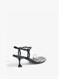 Back 3/4 image of the Tee Toe Ring Sandals in black/cream
