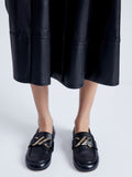 Image of model wearing the Monogram Loafer in black