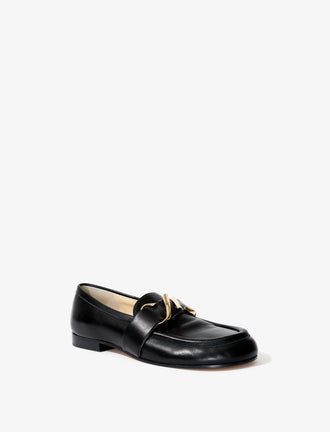Proenza Schouler 3/4 front image of the Monogram Loafer in black