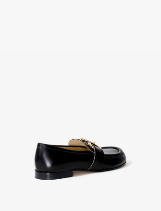 Proenza Schouler 3/4 back image of the Monogram Loafer in black