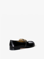 3/4 back image of the Monogram Loafer in black