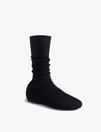 Front 3/4 image of Tee Knit Sock Boots in black