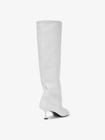 Back 3/4 image of Tee Knee High Boots in white