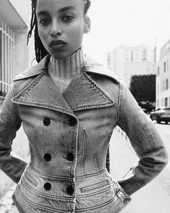 A portrait of a model in the Proenza Schouler FW26 Campaign wearing the Romane jacket in denim