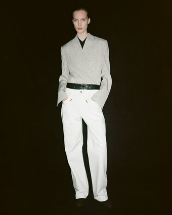 Full body image of model wearing Hadley Jacket in Melange Viscose Linen in grey multi with white Ellsworth jeans. 