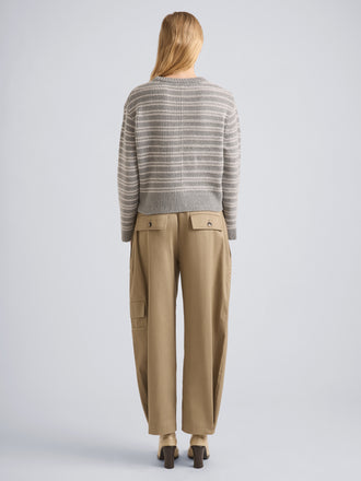 Proenza Schouler Back full length image of model wearing Pandora Sweater in Wool Stripe in Coal Grey