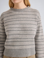 Proenza Schouler Detail image of model wearing Pandora Sweater in Wool Stripe in Coal Grey