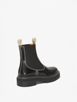 Proenza Schouler back 3/4 image of Lug Sole Chelsea Boots in black
